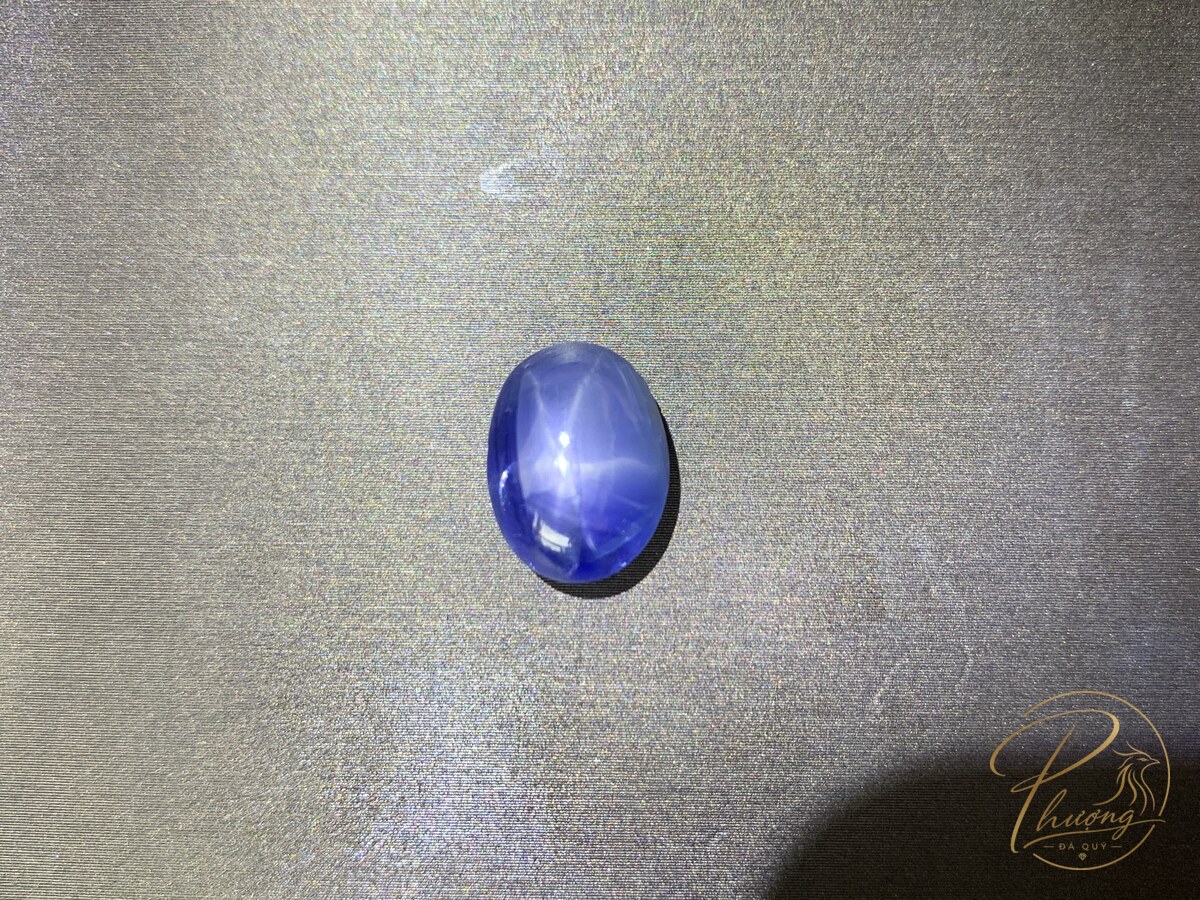 sapphire sao tự nhiên hiệu ứng ánh sao 6 cánh trên mặt cabochon